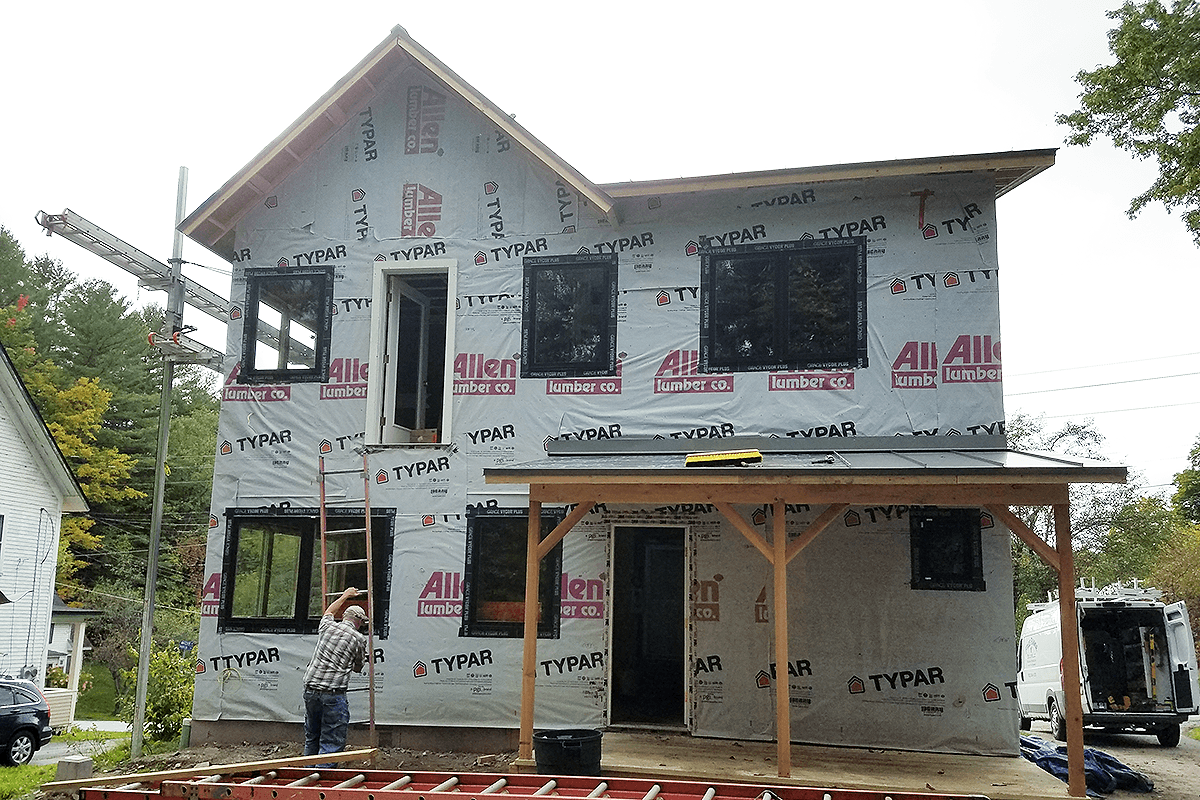 Image of addition with weatherization wrap by Free Range Builders