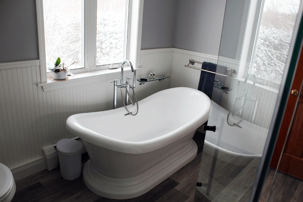 Image of tub installed in bathroom remodel by Free Range Builders