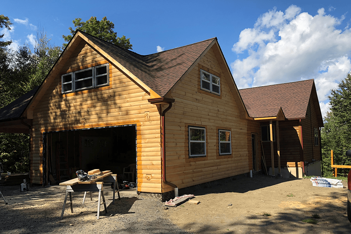 Image of nearly finished Montpelier garage and mudroom addition by Free Range Builders